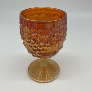 Imperial Carnival Glass Grape and Leaf Star Base Marigold Orange Pressed Glass